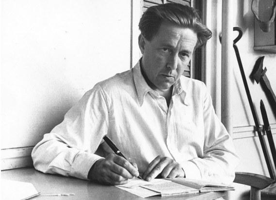 Александр Солженицын пишет за столом, 1959
